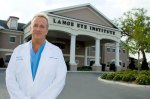 Dr. Michael Lange in front of The Lange Eye Institute.